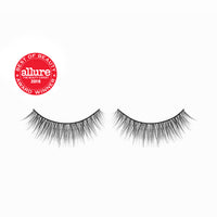 Lithe Lashes Core Collection lash style named 01 Fine and Delicate,  a product image displaying the lash pair on its own, floating on a white background and zoomed in and the Allure Best of Beauty winner seal in the upper left of the image, highlighting how beautiful and natural looking the false eyelashes look. 