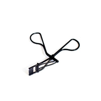 Lithe Lashes false lashes accessory, the Lithe Mini Lash Curler. A product image showing the matte black, sleep mini curler in the center of the photo on a white background.