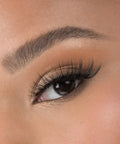 Lithe Lashes Bold Collection Style B2 - Full Flare, a close up eye thumbnail image of the model's eye wearing the false lashes for an up close perspective on how elegant the falsies look on the eye.