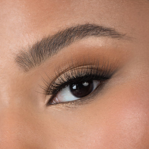 Lithe Lashes Bold Collection Style B5 - Fine & Fluttery, a close up eye thumbnail image of the model's eye wearing the false lashes for an up close perspective on how elegant the falsies look on the eye.