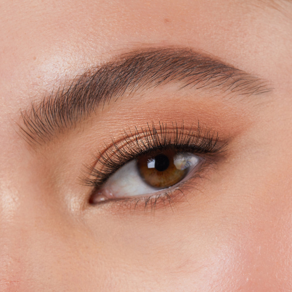 Lithe Lashes Core Collection lash style named 01 Fine and Delicate,  a close up eye thumbnail image of the model's eye wearing the false lashes for an up close perspective on how elegant the falsies look on the eye.