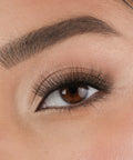 Lithe Lashes Core Collection lash style named 04 Long and Graceful, a close up eye thumbnail image of the model's eye wearing the false lashes for an up close perspective on how elegant the falsies look on the eye.